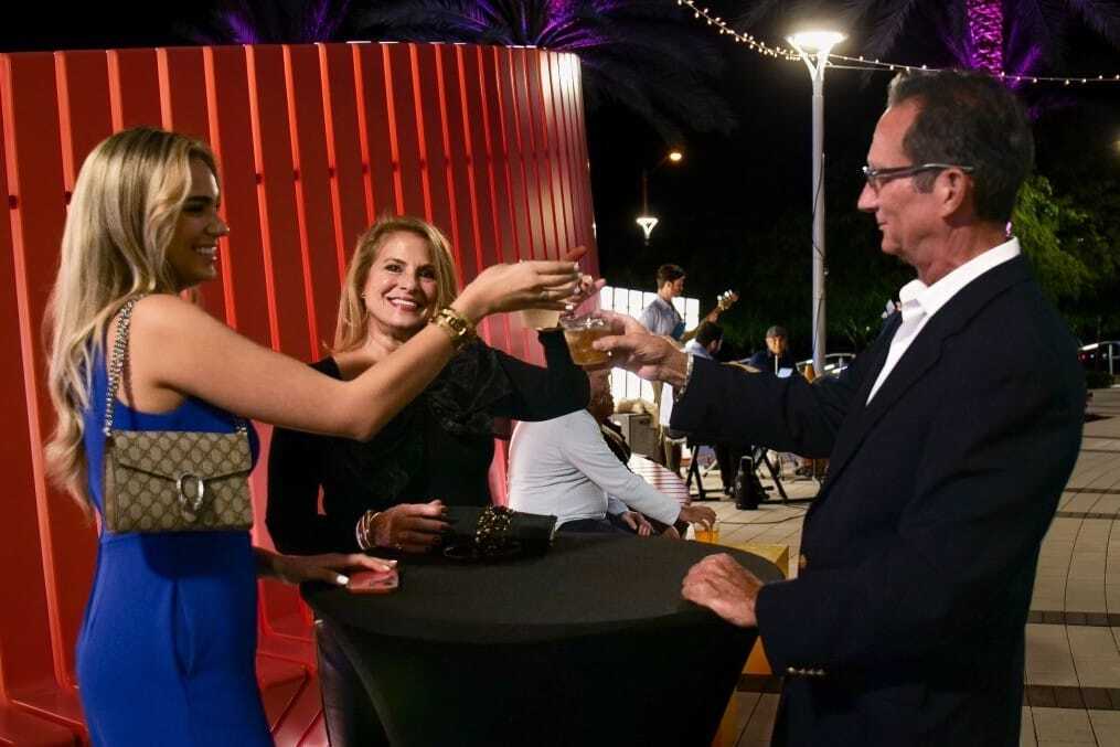 guests enjoying live music and drinks on The Kravis Family Plaza